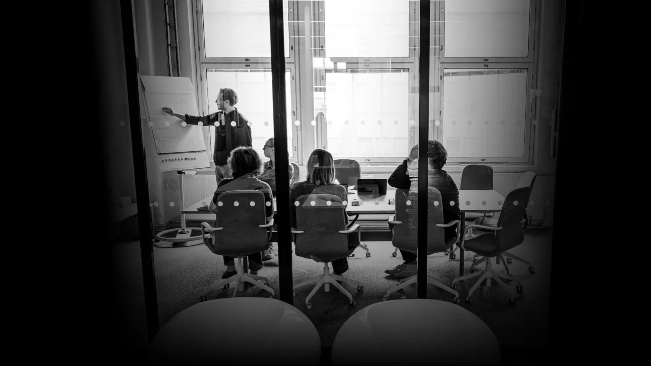 Group of people in a meeting room closeup