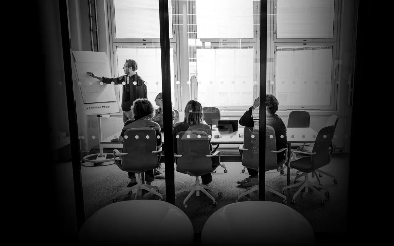 Group of people in a meeting room closeup