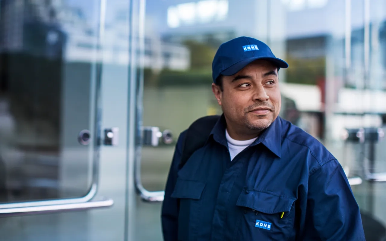 KONE technician standing