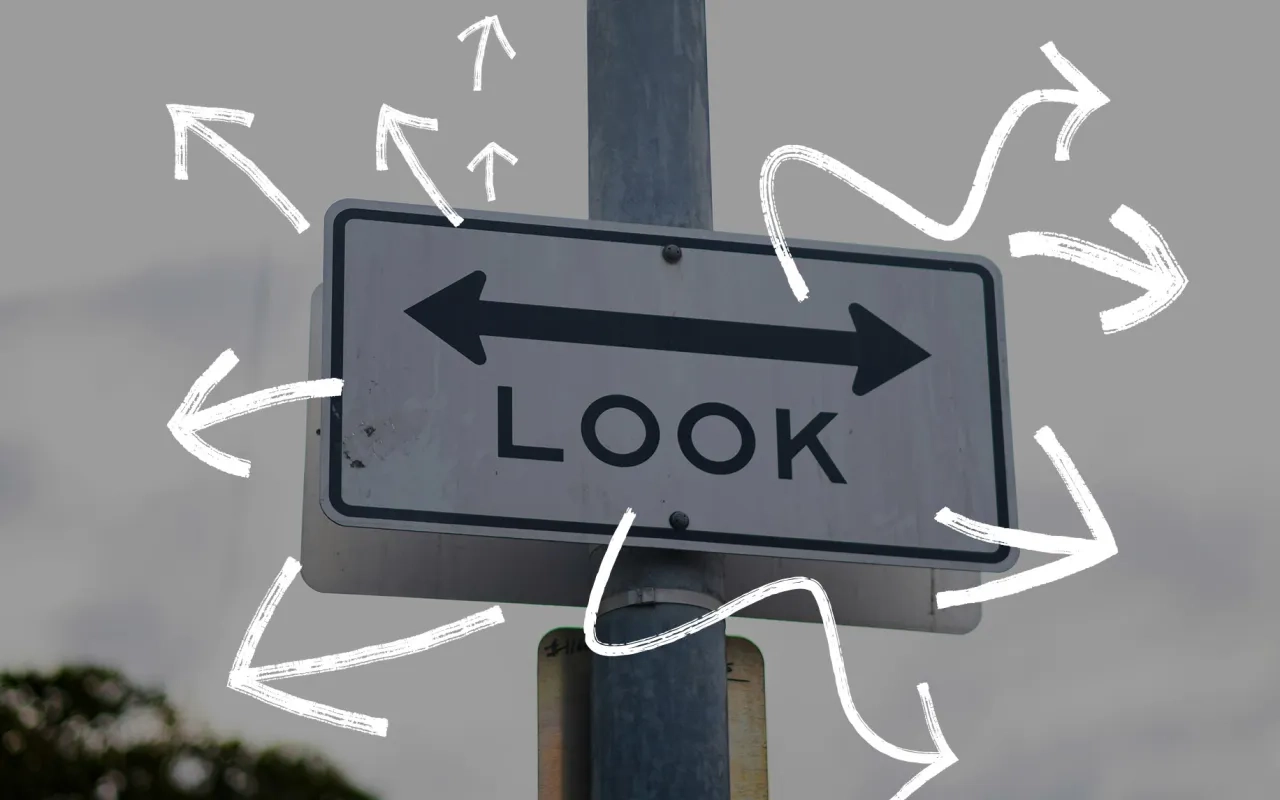 Look sign with arrows pointing in various directions.