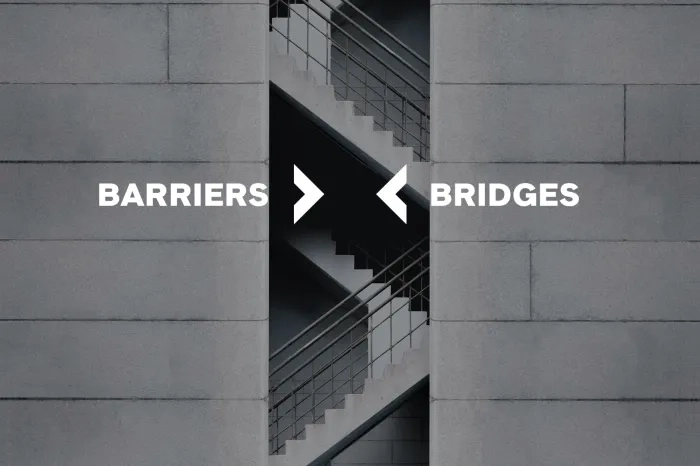 black and white image. Staircase peeking in the middle of the image. word barriers and bridges on top