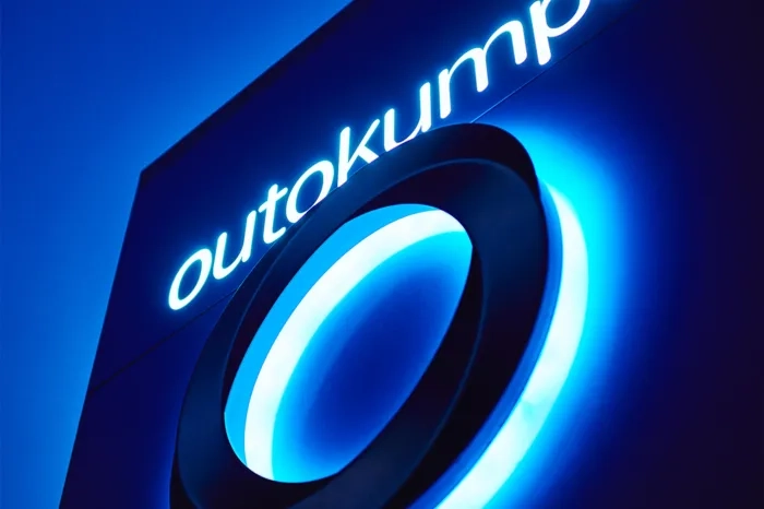 Outokumpu text and logo on dark blue background.