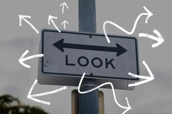 Look sign with arrows pointing in various directions.